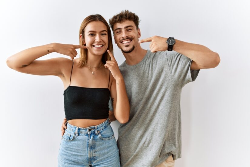 Photo of Two People Smiling